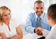 Man & Woman shaking hands with Property Manager
